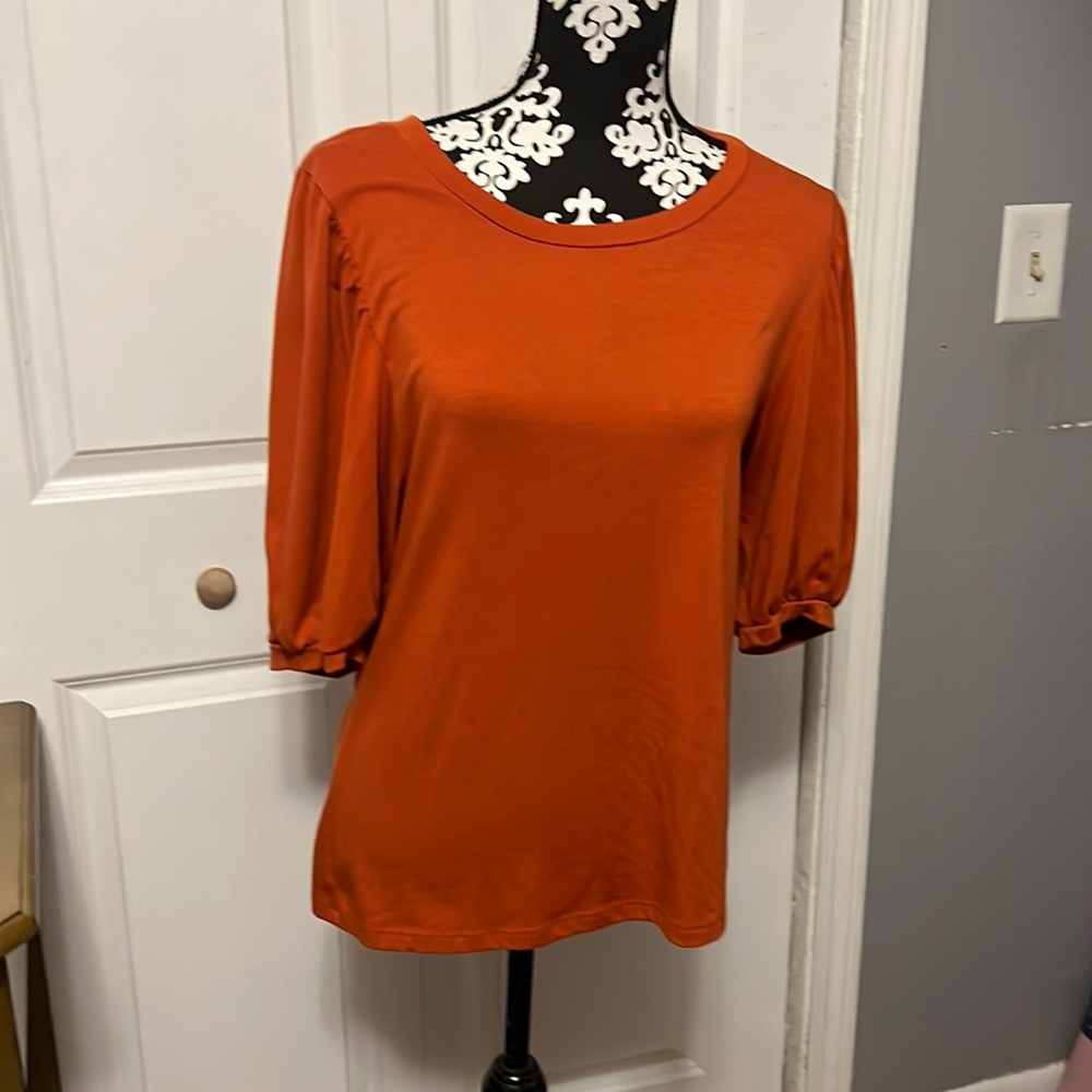 Orange flutter sleeve top size Large